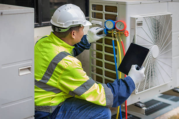 Professional Heat Pump Repair technician working in Marietta, NY